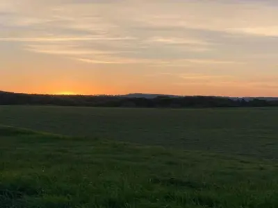 Blick auf den Sonnenuntergang/Sonnenaufgang von der Ferienwohnung aus oder aus der Nähe