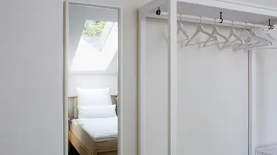 Ein Bett oder Betten in einem Zimmer der Unterkunft Ringelnatz & Lichtwer - Ferienwohnung Wurzen