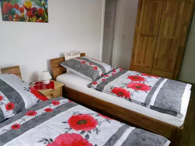 Ein Bett oder Betten in einem Zimmer der Unterkunft Ferienwohnung Familie Schneider