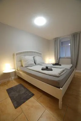 Ein Bett oder Betten in einem Zimmer der Unterkunft Apartment Bürgerstraße