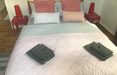 Ein Bett oder Betten in einem Zimmer der Unterkunft Ferienwohnung am Wald