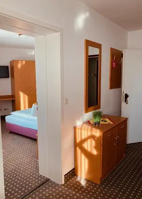 Ein Bett oder Betten in einem Zimmer der Unterkunft Akzent Congresshotel Hoyerswerda