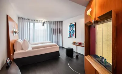 Ein Bett oder Betten in einem Zimmer der Unterkunft Penck Hotel Dresden