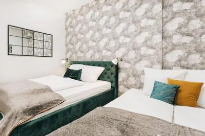 Ein Bett oder Betten in einem Zimmer der Unterkunft TIP! Modernes Apartment direkt im Herzen Dresdens