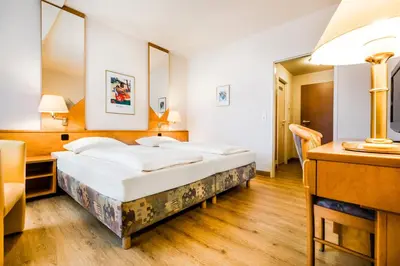 Ein Bett oder Betten in einem Zimmer der Unterkunft Taste Hotel Dresden-ehemals Residenz Alt Dresden
