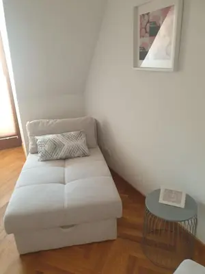 Ein Bett oder Betten in einem Zimmer der Unterkunft Modernes Apartment an der Frauenkirche