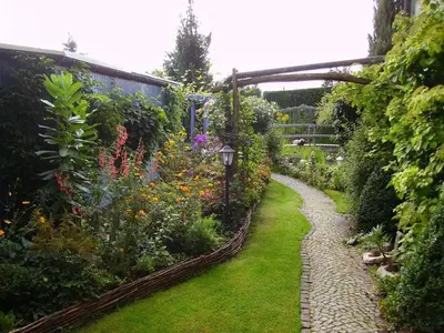 Ein Garten an der Unterkunft Ferienhaus-Weitblick