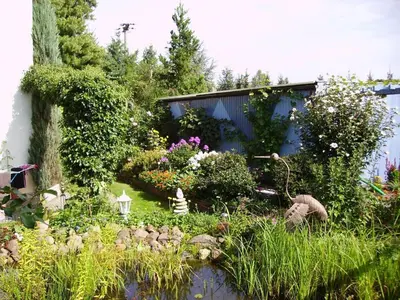 Ein Garten an der Unterkunft Ferienhaus-Weitblick