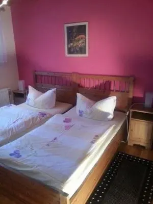 Ein Bett oder Betten in einem Zimmer der Unterkunft Ferienhaus-Weitblick