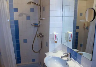 Ein Badezimmer in der Unterkunft Hotel Am Terrassenufer