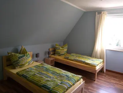 Ein Bett oder Betten in einem Zimmer der Unterkunft Ferienappartment Henke