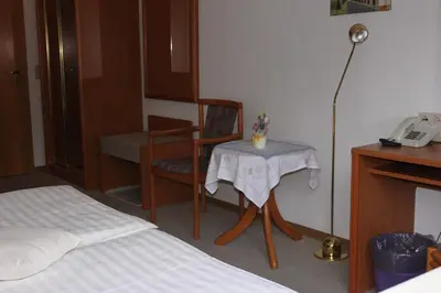 Ein Bett oder Betten in einem Zimmer der Unterkunft Hotel Kirchner