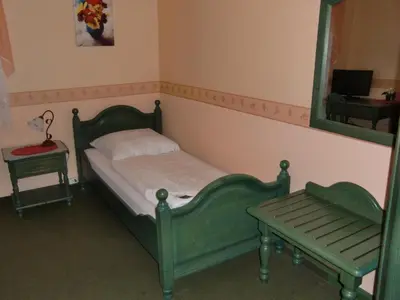 Ein Bett oder Betten in einem Zimmer der Unterkunft Hotel Heidehof