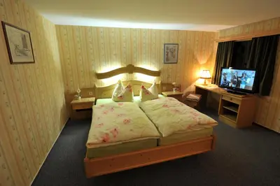 Ein Bett oder Betten in einem Zimmer der Unterkunft Hotel Wenzels Hof
