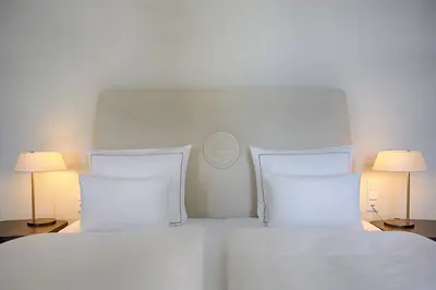 Ein Bett oder Betten in einem Zimmer der Unterkunft Gewandhaus Dresden, Autograph Collection