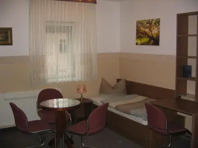 Ein Sitzbereich in der Unterkunft Pension 