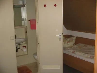 Ein Bett oder Betten in einem Zimmer der Unterkunft Pension 
