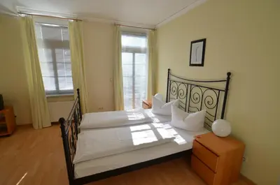 Ein Bett oder Betten in einem Zimmer der Unterkunft Gästehaus Villa Seraphinum