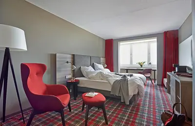 Ein Bett oder Betten in einem Zimmer der Unterkunft Seaside Residenz Hotel Chemnitz