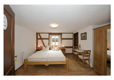 Ein Bett oder Betten in einem Zimmer der Unterkunft Pension Bauernhaus Vetter