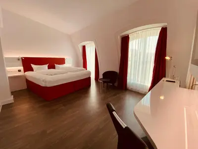 Ein Bett oder Betten in einem Zimmer der Unterkunft DORMERO Hotel Dresden City