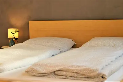 Ein Bett oder Betten in einem Zimmer der Unterkunft Dresden Altstadtblick - Altstadtnah & Ruhig