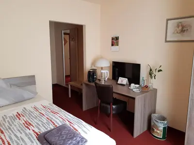 Ein Bett oder Betten in einem Zimmer der Unterkunft Hotel Zwei Linden