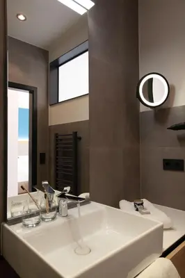 Ein Badezimmer in der Unterkunft Hotel Ross