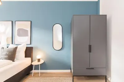 Ein Bett oder Betten in einem Zimmer der Unterkunft Limehome Dresden Jordanstraße