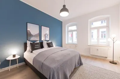 Ein Bett oder Betten in einem Zimmer der Unterkunft Limehome Dresden Jordanstraße