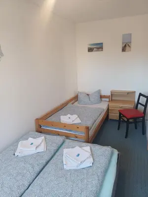 Ein Bett oder Betten in einem Zimmer der Unterkunft Ferienwohnung Beim Rößl
