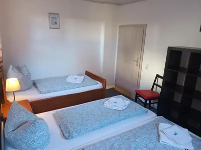 Ein Bett oder Betten in einem Zimmer der Unterkunft Ferienwohnung Beim Rößl
