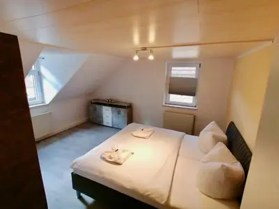 Ein Bett oder Betten in einem Zimmer der Unterkunft Haus am Malerweg