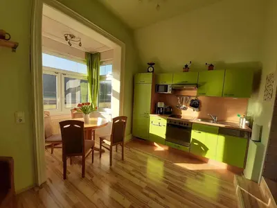 Küche/Küchenzeile in der Unterkunft Ferienwohnung Elbsommer am Weinberg