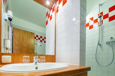 Ein Badezimmer in der Unterkunft Kim Hotel Im Park