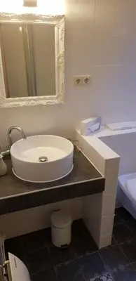 Ein Badezimmer in der Unterkunft Hotel Reichskrone
