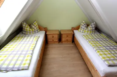 Ein Bett oder Betten in einem Zimmer der Unterkunft Ferienhaus Schild