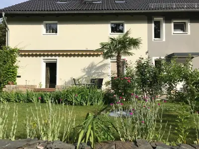 Ein Garten an der Unterkunft Pension Gesundbrunnen
