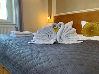 Ein Bett oder Betten in einem Zimmer der Unterkunft Pension Gesundbrunnen