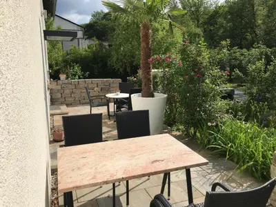 Ein Garten an der Unterkunft Pension Gesundbrunnen
