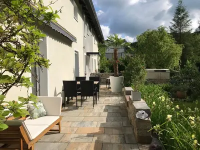 Ein Garten an der Unterkunft Pension Gesundbrunnen