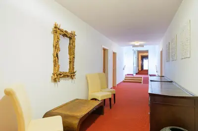 Ein Sitzbereich in der Unterkunft Hotel Garden Cottage mit kostenfreien Parkplätzen
