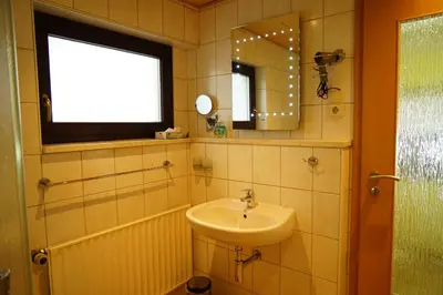 Ein Badezimmer in der Unterkunft Pension Nr. 13 - B&B