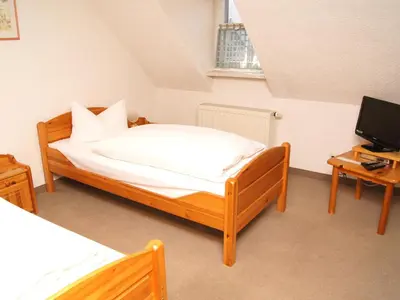 Ein Bett oder Betten in einem Zimmer der Unterkunft Alt Coswigerhof