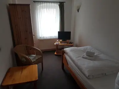 Ein Bett oder Betten in einem Zimmer der Unterkunft Alt Coswigerhof