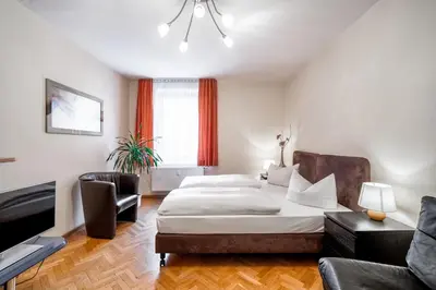 Ein Bett oder Betten in einem Zimmer der Unterkunft Aparthotel Münzgasse An der Frauenkirche
