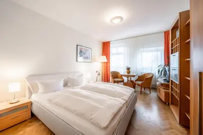 Ein Bett oder Betten in einem Zimmer der Unterkunft Aparthotel Münzgasse An der Frauenkirche