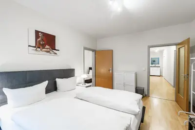 Ein Bett oder Betten in einem Zimmer der Unterkunft Aparthotel Münzgasse An der Frauenkirche