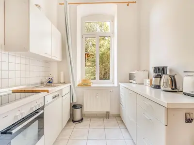 Küche/Küchenzeile in der Unterkunft Wohnung mit großer Gemeinschaftsterrasse