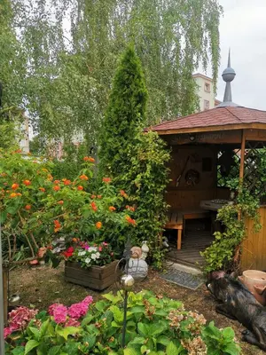 Ein Garten an der Unterkunft Gästezimmer- und Ferienzimmer Am Gewölbekeller Meißen